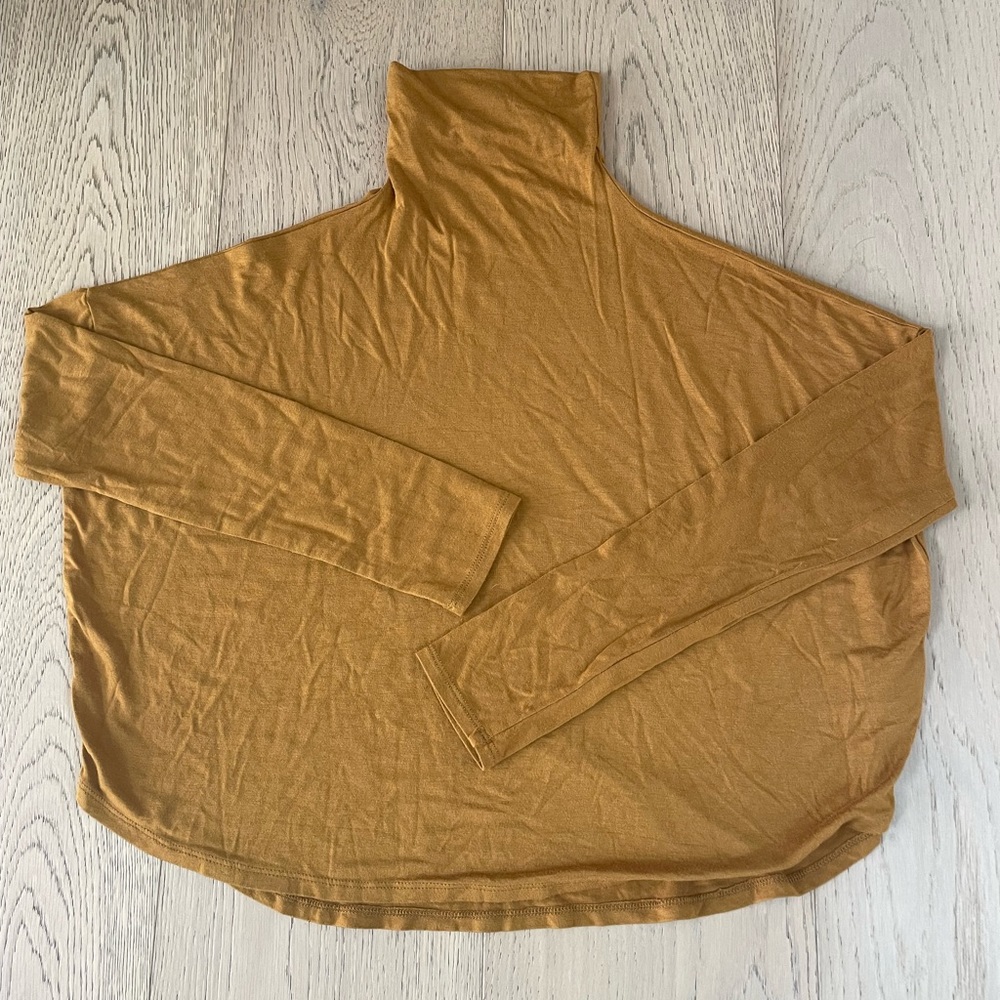 Babaton gold cropped at waist long sleeve.